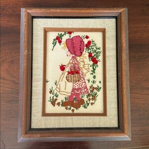 Framed Embroidered Girl with approximate dimensions 10 3/4” long by 8 3/4” wide